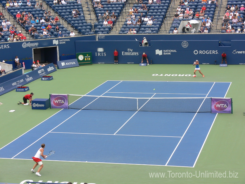 Sara Errani (ITA) and Lesia Tsurenko (UKR) playing on Centre Court 14 August 2015 Rogers Cup Toronto