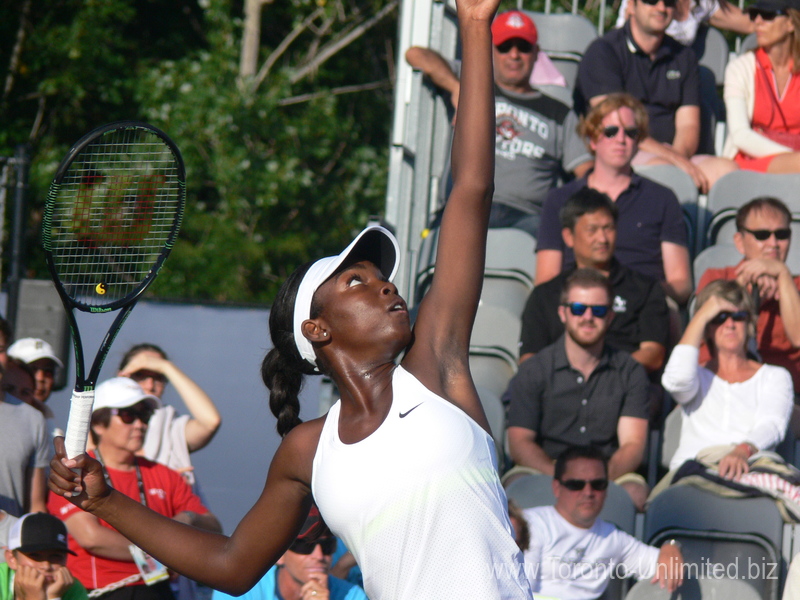 Francoise Abanda (CDN) with her serve to Andrea Petkovic (GER) 11 August 2015 Rogers Cup Toronto 