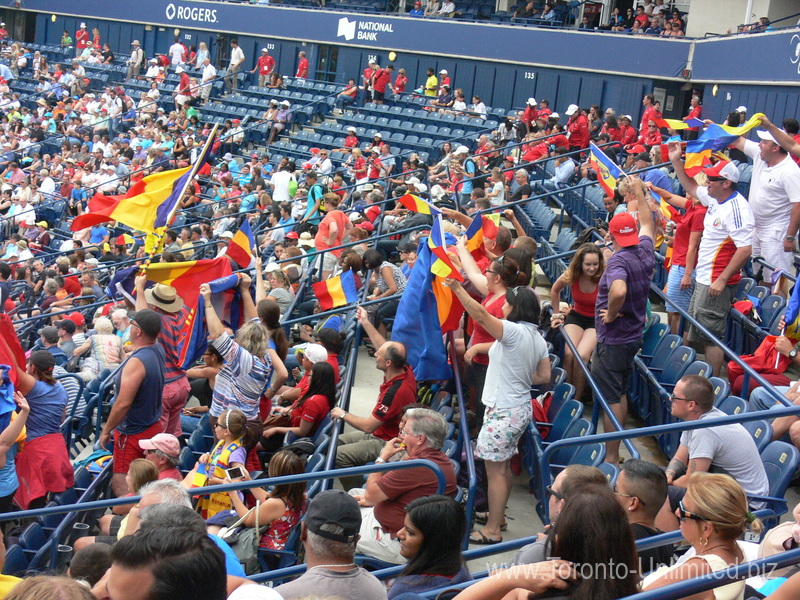 Romanian supporters of Simona Halep on the Stadium waving the flags 14 August 2015 Rogers Cup Toronto.