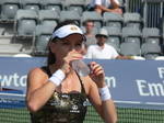 Agnieszka Radwanska taking a sip of bottled water during break playing Alize Cornet (FRA) 13 August 2015 Rogers Cup Toronto