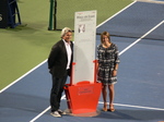 Justine Henin on Centre Court with Karl Hale during the induction cremony into Rogers Cup Hall of Fame 15 August 2015 Rogers Cup Toronto 
