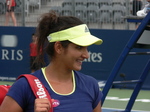 Sanja Mirza (IND) poses for photos after her doubles win 14 August 2015 Rogers Cup Toronto