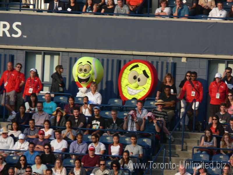 A Tennis Ball and Tennis Racquet as Mascots at Rogers Cup 2015 Toronto