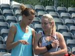 Lucie Safarova and Bethanie Mattek-Sands are deeply interested in something. 16 August 2015 Rogers Cup Toronto!