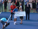 Novak Djokovic receiving a winner's cheque of U.S. S 782,525 from Karen Legget of National Bank. Rogers Cup 2016 Champion