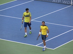 Ivan Dogic (CRO) and Marcelo Melo (BRA) playing on Centre Court in doubles final 31 July 2016 Rogers Cup Toronto