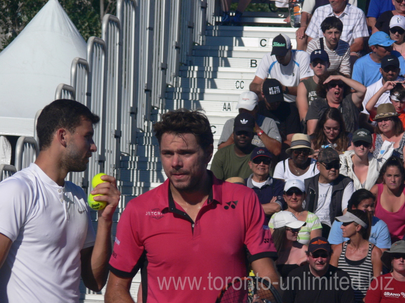 Grigor Dimitrov (BUL) talking to Stan Wawrinka (SUI) during doubles match against Lucas poille and Dominic Thiem 25 July 2016 Rogers Cup Toronto