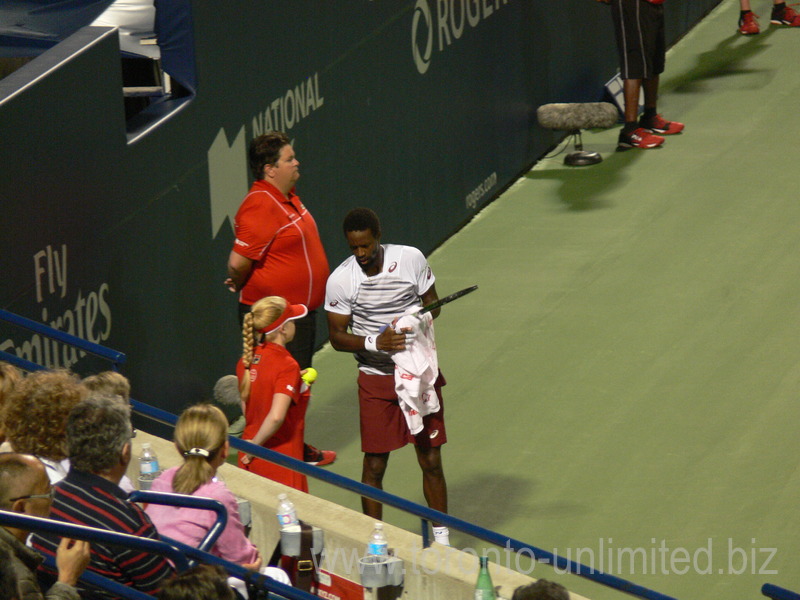 Gael Monfils with the towel on Central Court playing Canadian Milos Raonic on Central Court 29 July 2016 Rogers Cup Toronto