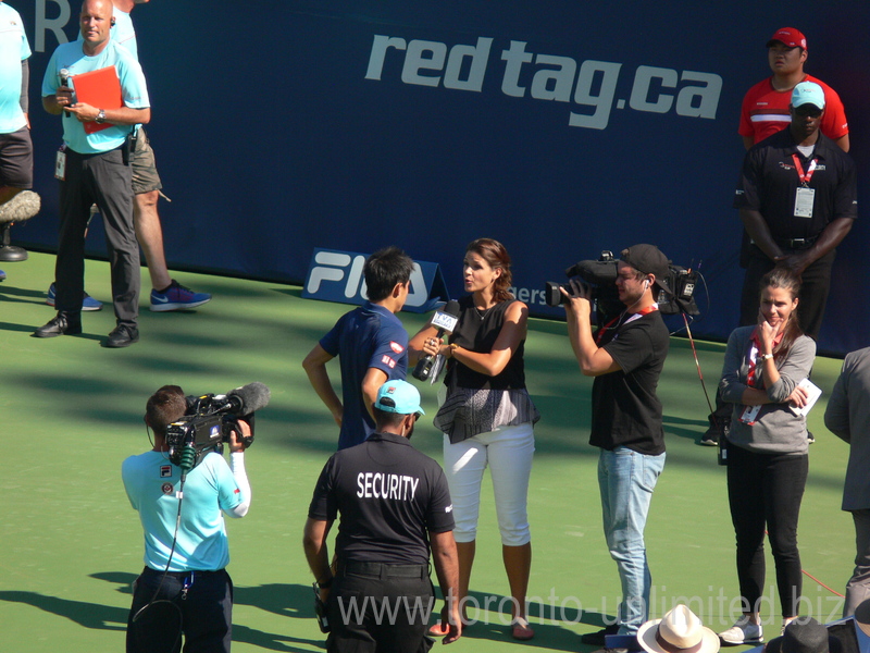 Kei Nishikori (JPN) in on-the-court interview by TVA Sportsnetwork sportscaster on Central Court 30 July 2016 Rogers Cup Toronto