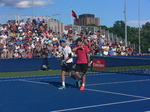 Stan Warinka with Grigor Diitrov at service line during doubles match against Lucas Poille and Dominic Thiem 25 July 2016 Rogers Cup Toronto