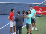 Milos Raonic (CDN) with Arash Madini during postgame interview 27 July 2016 Rogers Cup in Toronto