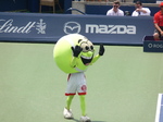 A Tennis Ball Mascot on Central Court