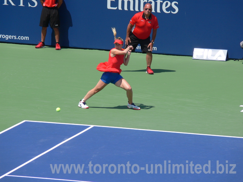 Elena Svitolina is returning backhand on Centre Court during singles final 13 August 2017