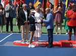 Marten Gagnon of National Bank presenting Trophy to the runner up Caroline Wozniacki!