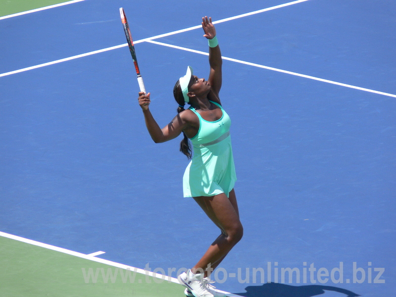 Sloane Stephens serving on Central Court to Caroline Wozniacki (DEN)  .