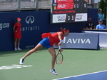 Caroline Garcia (FRA) serving to Simona Halep (ROU) on Central Court in an evening match 11 August 2017 Rogers Cup.