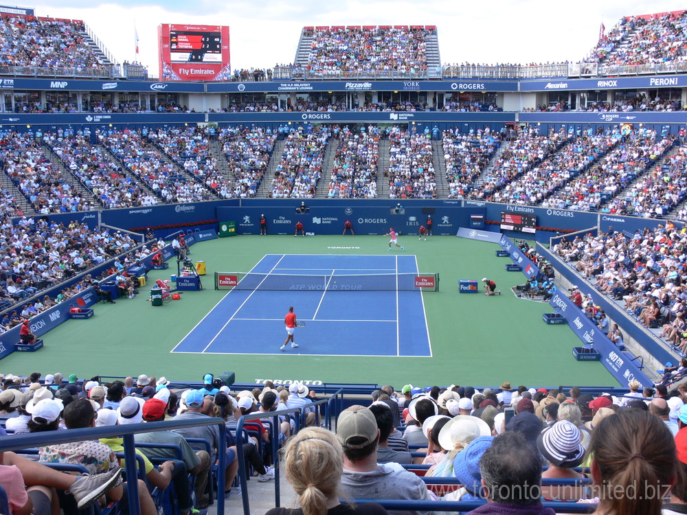 Stefanos Tsitsipas returning the ball to Rafael Nadal in Singles Final on Centre Court August 12, 2018 Rogers Cup Toronto!