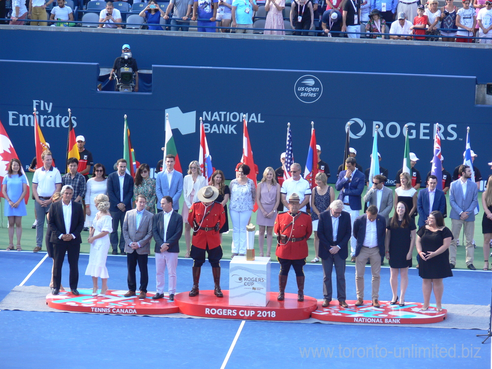 Rogers Cup 2018 Closing Ceremony - Thanks to the Tennis Canada Organizing Committee, Ball Crew and more than 1000 Volunteers: From the left; Karl Hale - Tournament Director, Suzan Rogers - Rogers Communication, Louis Vachon - President of National Bank, Gavin Ziv - Managing Director of Rogers Cup, Derek Rowe - Chairman of the Board Tennis Canada, Lars Graff - ATP Supervisor, Jane and Sara representing Volunteers. Ken Crosina a Master of Ceremonies and Announcer
