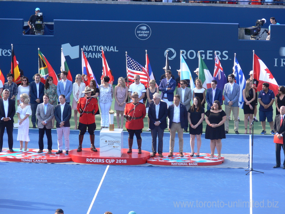 Rogers Cup 2018 Closing Ceremony - Thanks to the Tennis Canada Organizing Committee, Ball Crew and more than 1000 Volunteers: From the left; Karl Hale - Tournament Director, Suzan Rogers - Rogers Communication, Louis Vachon - President of National Bank, Gavin Ziv - Managing Director of Rogers Cup, Derek Rowe - Chairman of the Board Tennis Canada, Lars Graff - ATP Supervisor, Jane and Sara representing Volunteers. Ken Crosina a Master of Ceremonies and Announcer