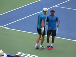 Raven Klaasen (RSA) and Michael Venus (NZL) talking strategy on the Centre Court. Doubles Final August 12, 2018 Rogers Cup Toronto!