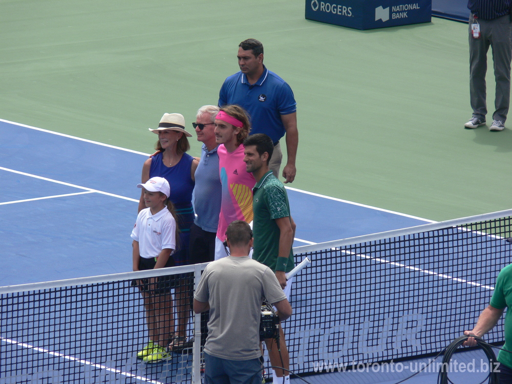 On the Centre Court from the right: Novak Djokoviv, Stefanos Tsitsipas, father Apostolos Tsitsipas and mother Julia Apostoli-Salnikova August 9, 2018 Rogers Cup Toronto.