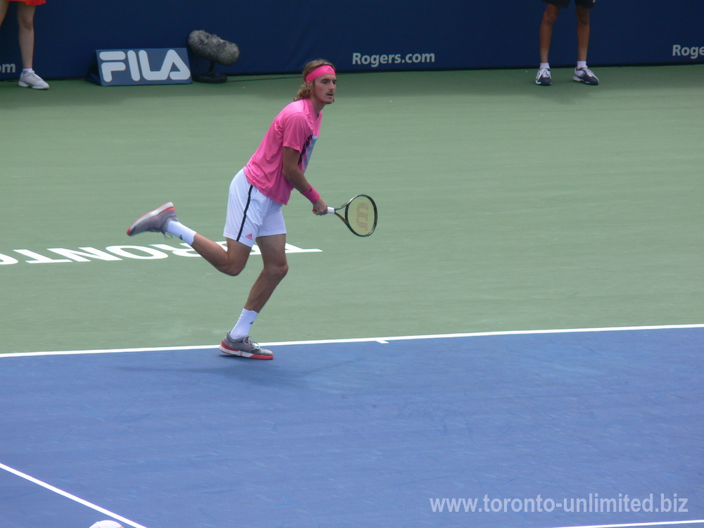 Stefanos Tsitsipas running on the Centre Court playing Novak Djokovic August 9, 2018 Rogers Cup Toronto