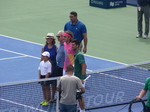 On the Centre Court from the right: Novak Djokovic, Stefanos Tsitsipas, father Apostolos Tsitsipas and mother Julia Apostoli-Salnikova August 9, 2018 Rogers Cup Toronto.