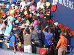 Stefanos Tsitsipas signing autographs to the fans August 11, 2018