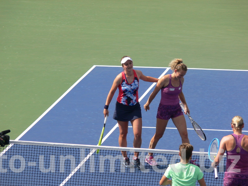 The opponets in Doubles Final are coming to the Net to skahe the hands, August 11, 2019 Rogers Cup Toronto