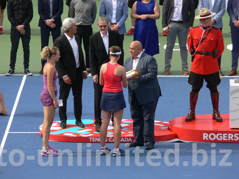 Doubles Champions Katerina Siniakova with Barbora Krejcikova are receiving Trophy from Tarek Naquib of National Bank, August 11, 2019 Rogers Cup Toronto