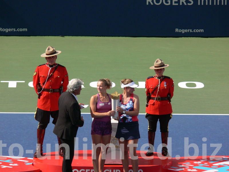 Karl Hale, Tournament Director is talking to Doubles Champions Siniakova and Krejcikova, August 11, 2019 Rogers Cup Toronto