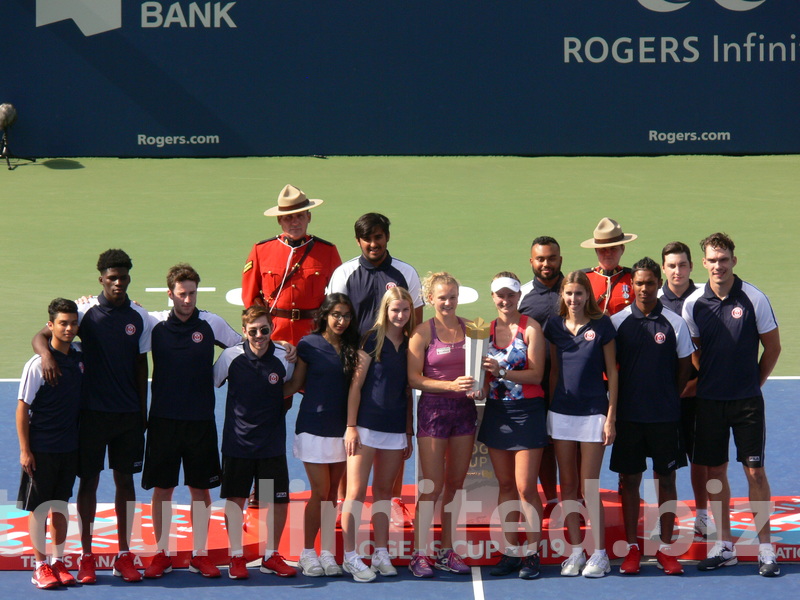 Doubles Champions Siniakova and Krejcikova with ground crew, August 11, 2019 Rogers Cup