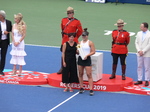 Lucie Blanchet of National Bank and Champion Bianca Andresu in front of two Honor Guards, Karl Hale, Suzan Rogers and Gavin Ziv, August 11, 2019 Rogers Cup Toronto 