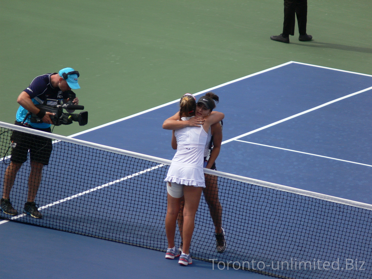 Shake hands and hug your opponent at the end of semifinal match on Centre Court, August 9, 2019 Rogers Cup in Toronto