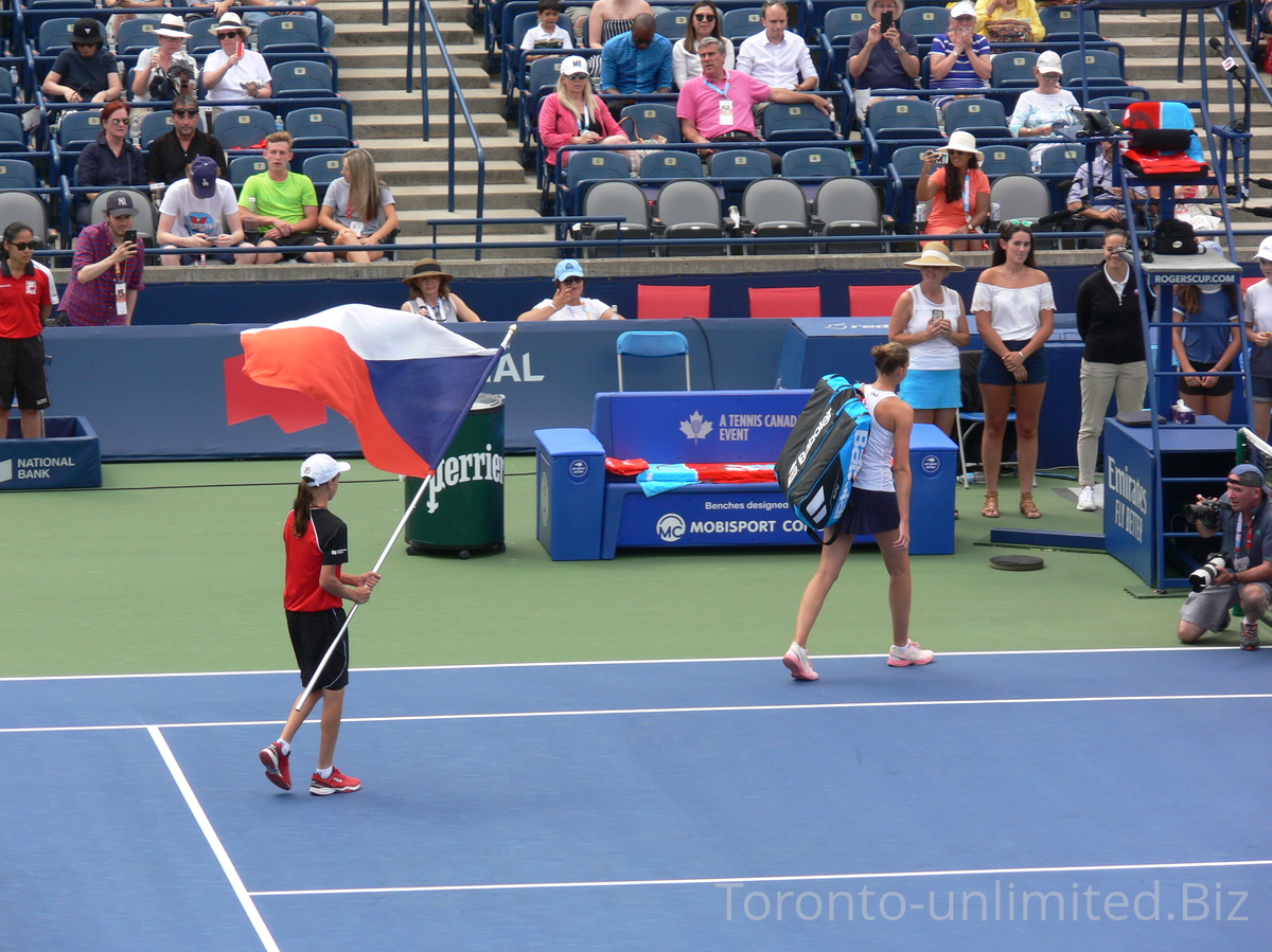 Karolina Pliskova is coming to the Centre Court with the Czech Flag to play quarterfinal match with Canadian Star Bianca Andrescu, August 9, 2019 Rogers Cup Toronto 