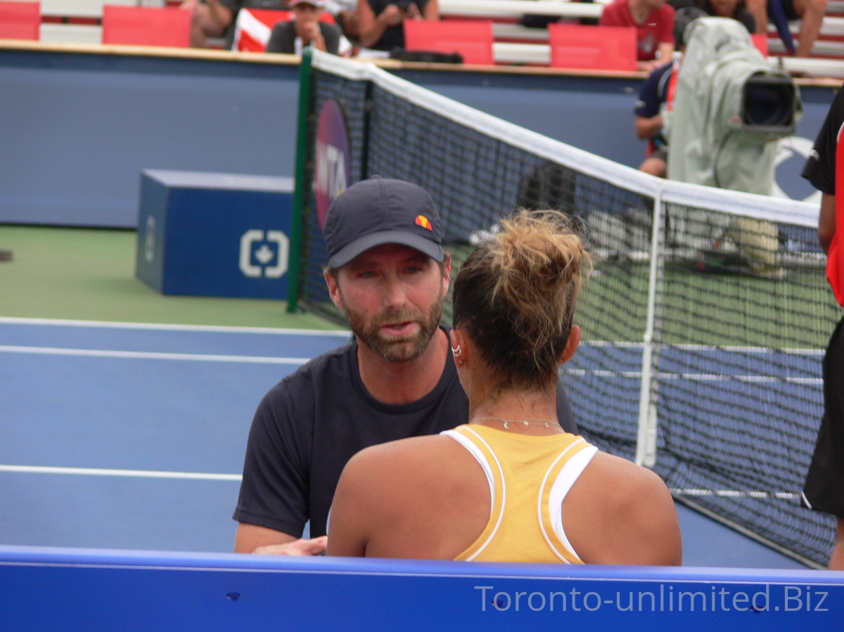 Madison Keys during changeover in talk with her coach. August 3, 2019 qualifying match for Rogers Cup