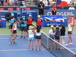 Andrescu and Pliskova waiting for the coin toss on Centre Court, August 9, 2019 