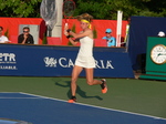 Marie Bouzkova on the baseline returning backhand to Jelena Ostapenko, Augsut 8, 2019 Rogers Cup in Toronto