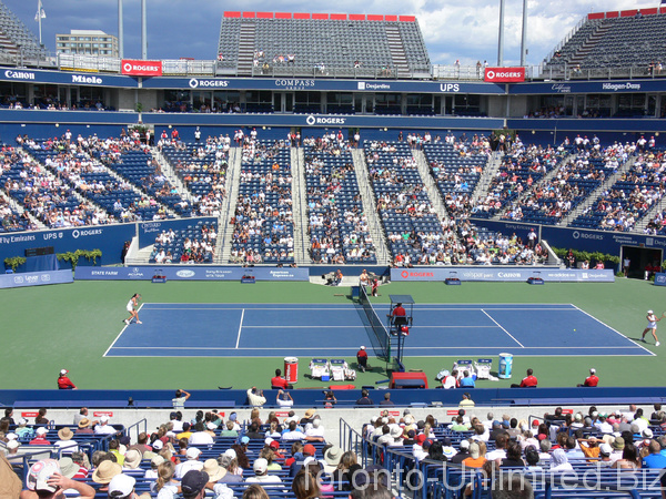 Jelena Jankovic of Serbia on the left, with Virginie Razzano of France. Rogers Cup 2007 Toronto!