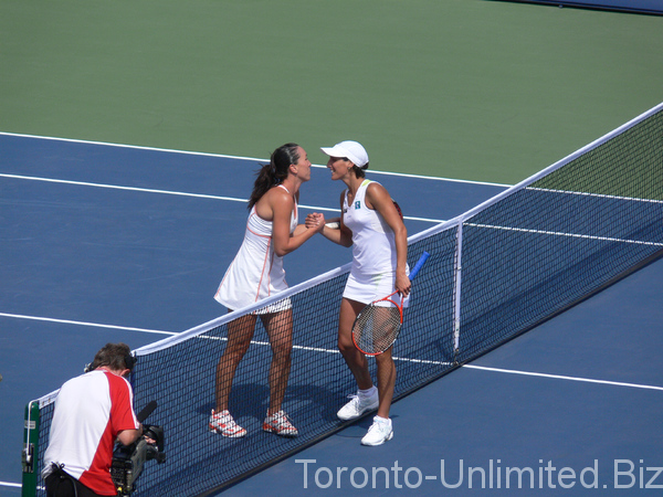 Jelena Jankovich winner and Virginie Razzano after the Championship point. 2007 Rogers Cup in Toronto. 