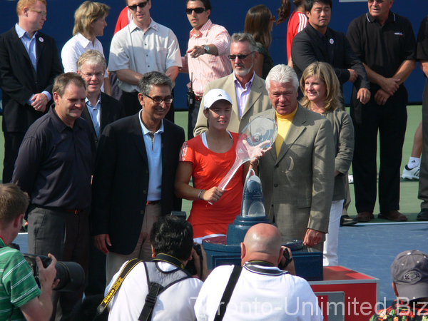Justine Henin Champion with Nadir Mohamed Chief Operating officer of Rogers Communication!