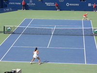 Jelena Jankovic and Justine Henin on the court. Rogers Cup 2007 Toronto!