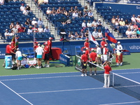 Srebotnik Sugiyama with Black and Huber coming to Centre Court.