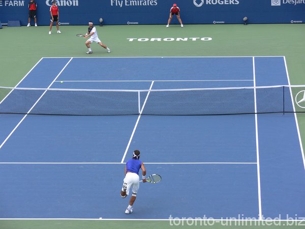 Nadal up front and Kiefer in the back of the court.