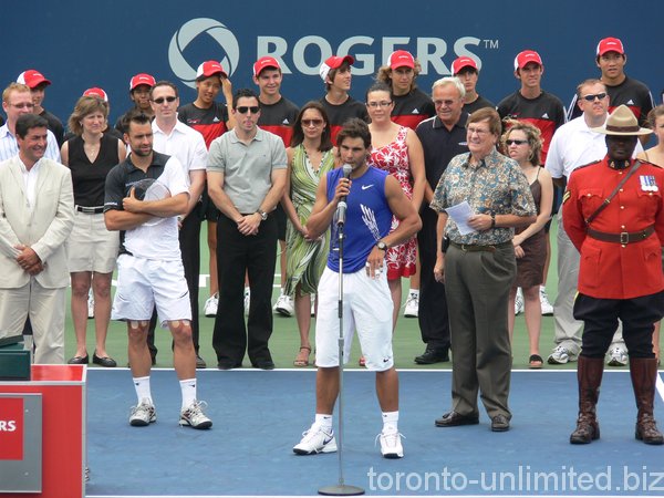 Rafael Nadal talking to the microphone.