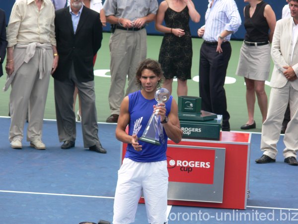 Rafael nadal and his Championship Trophy.