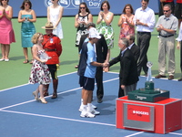 Doubles runner ups Mike and Bob Bryan being congratulated.