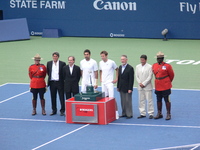 Nestor and Zimjonic, Doubles Champions posing for pictures.