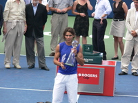 Rafael nadal and his Championship Trophy.
