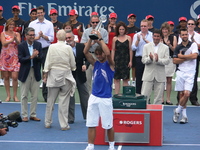 Rafael Nadal lifting Championship Trophy. 